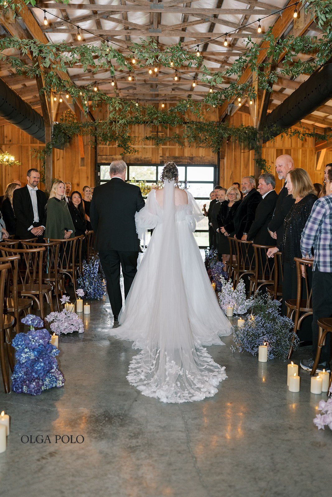 Maia walking down the aisle during the Boone Valley Farm ceremony