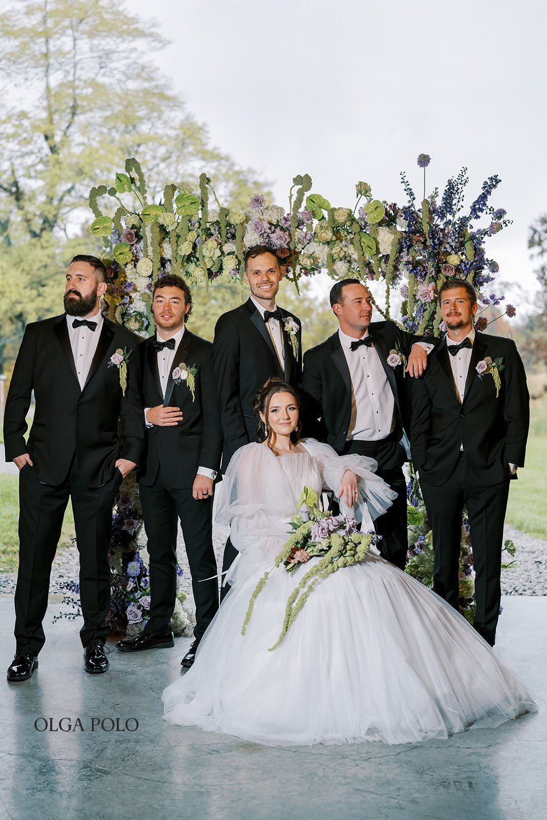 Maia with Troy's groomsmen during wedding-party portraits