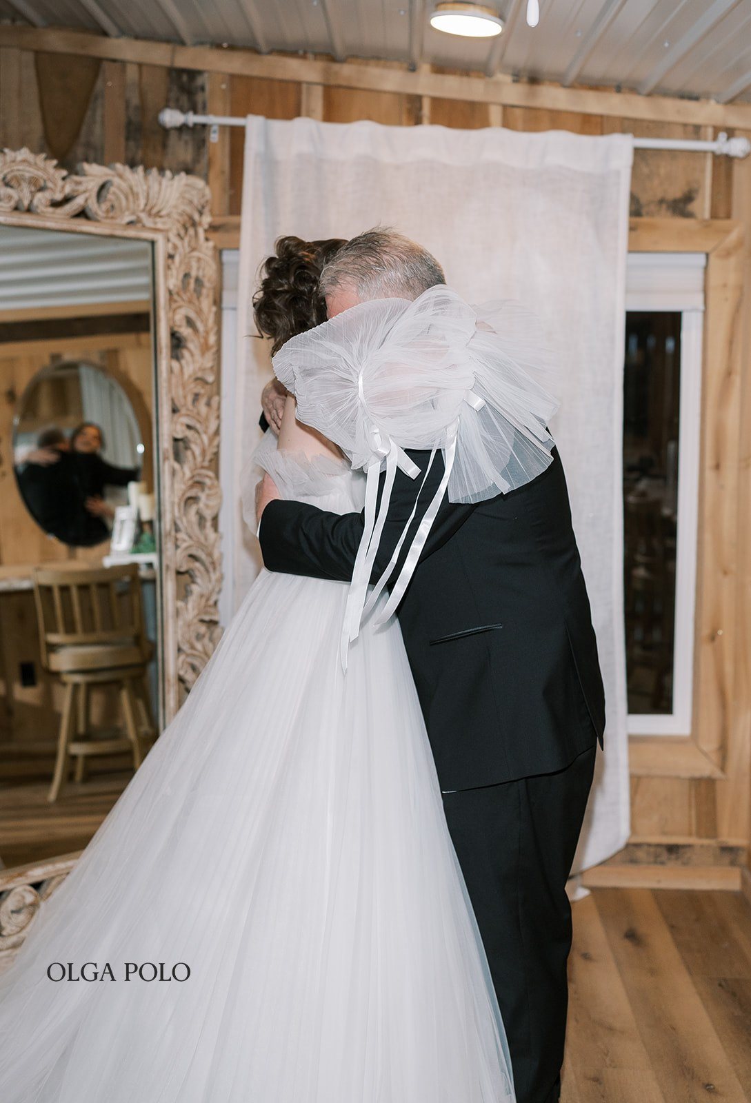 Maia hugging her father during their first-look moment