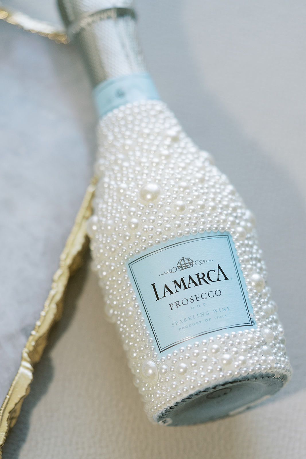 Champagne bottle detail photographed during Ronnie and Patrick's wedding day
