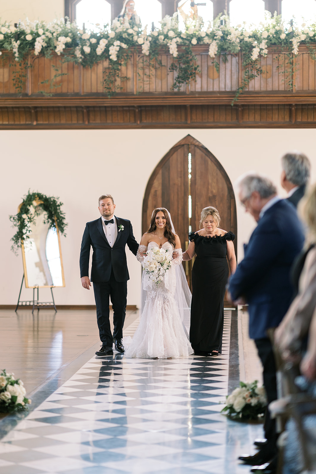 Ronnie entering the ceremony aisle with her escort at The Palomar Cincinnati