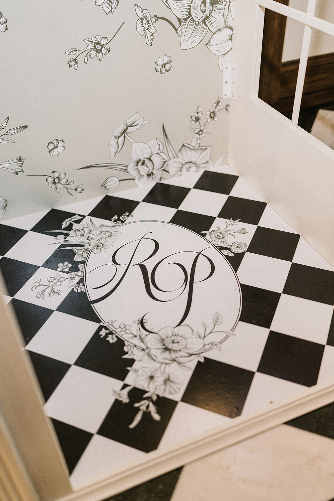 Ronnie and Patrick's RP wedding monogram displayed on The Palomar's checkerboard floor