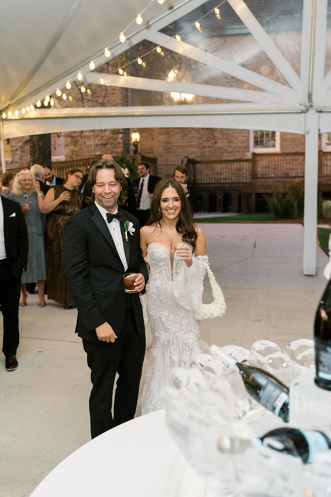 Ronnie and Patrick together during an evening reception moment