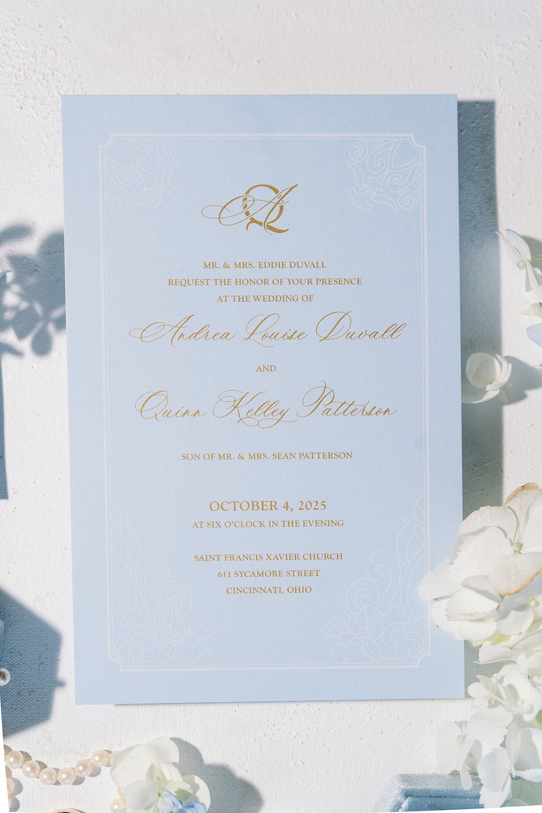 Andee & Quinn wedding at The Cincinnati Club: wedding invitation flatlay.