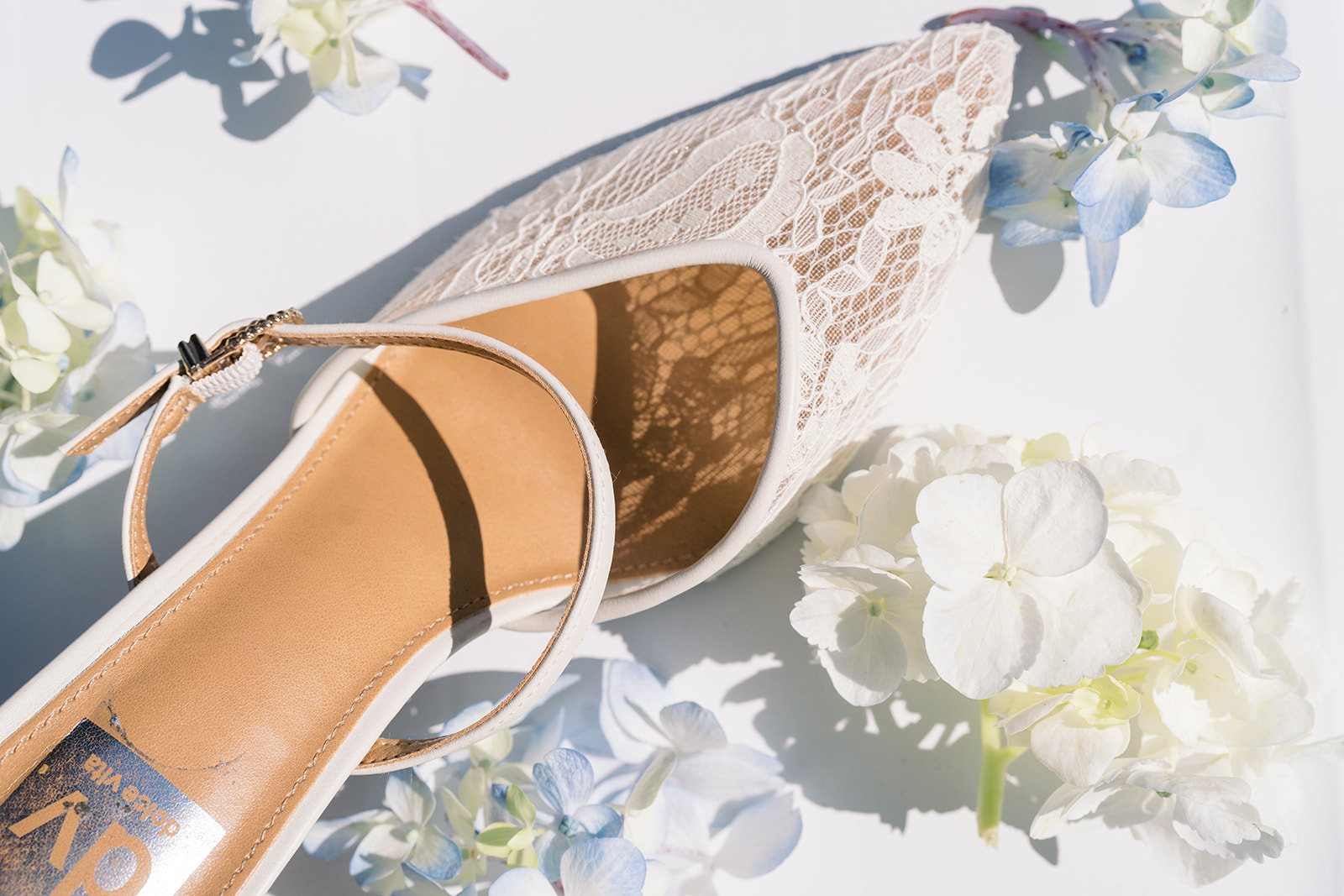 Andee & Quinn wedding at The Cincinnati Club: bridal shoes lace blue florals.