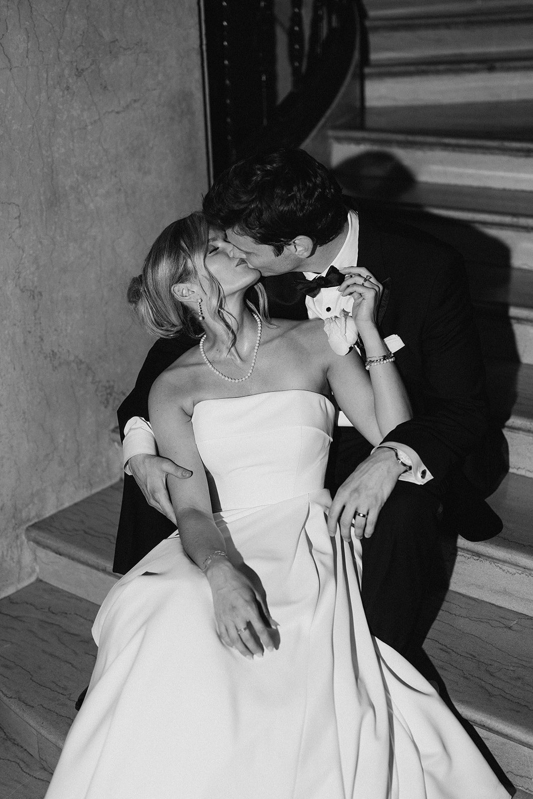 Andee & Quinn wedding at The Cincinnati Club: staircase embrace black white.