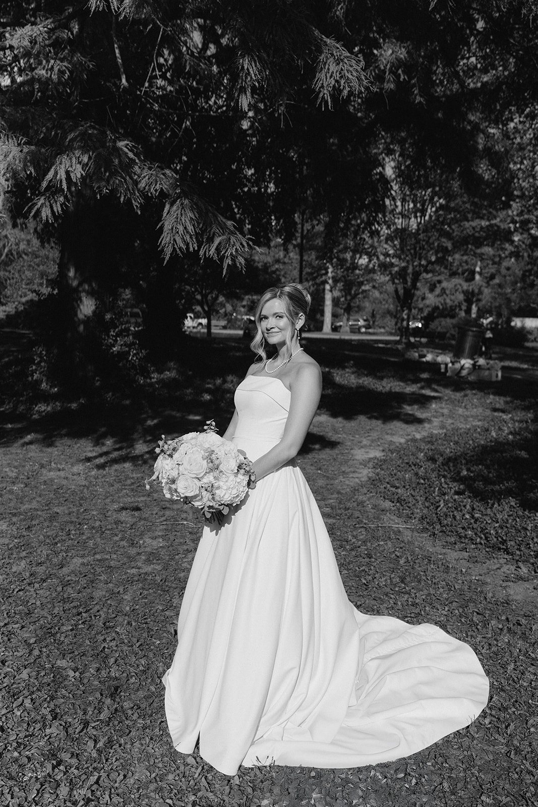 Andee & Quinn wedding at The Cincinnati Club: bride garden portrait black white.