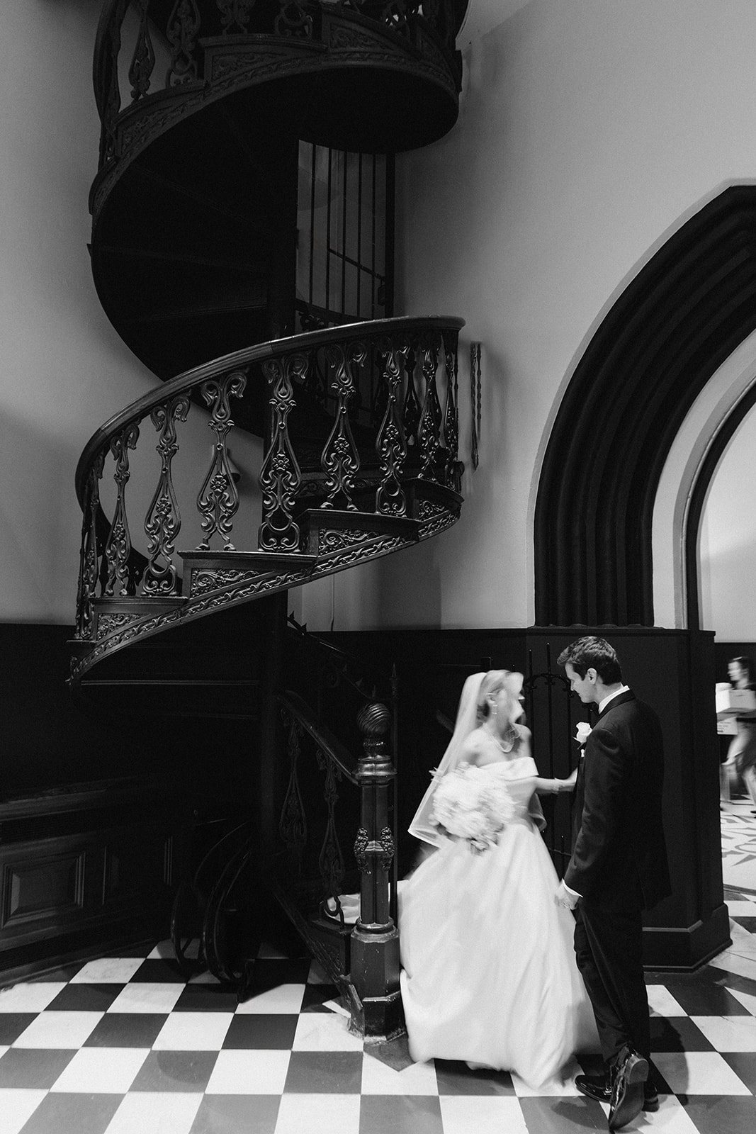 Andee & Quinn wedding at The Cincinnati Club: bride staircase black white.