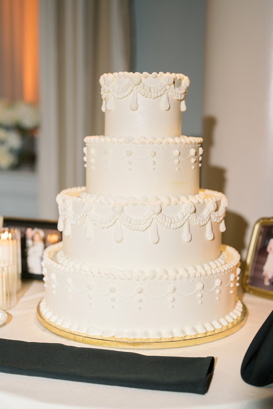 Tiered white wedding cake at Andee and Quinn's Cincinnati Club reception