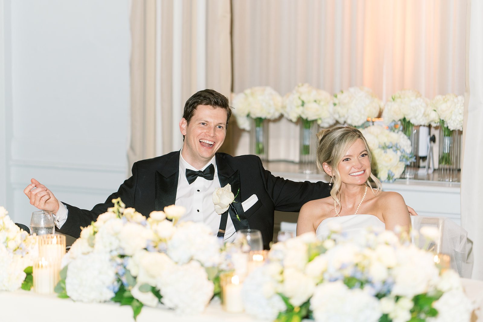 Andee & Quinn wedding at The Cincinnati Club: sweetheart table candid.