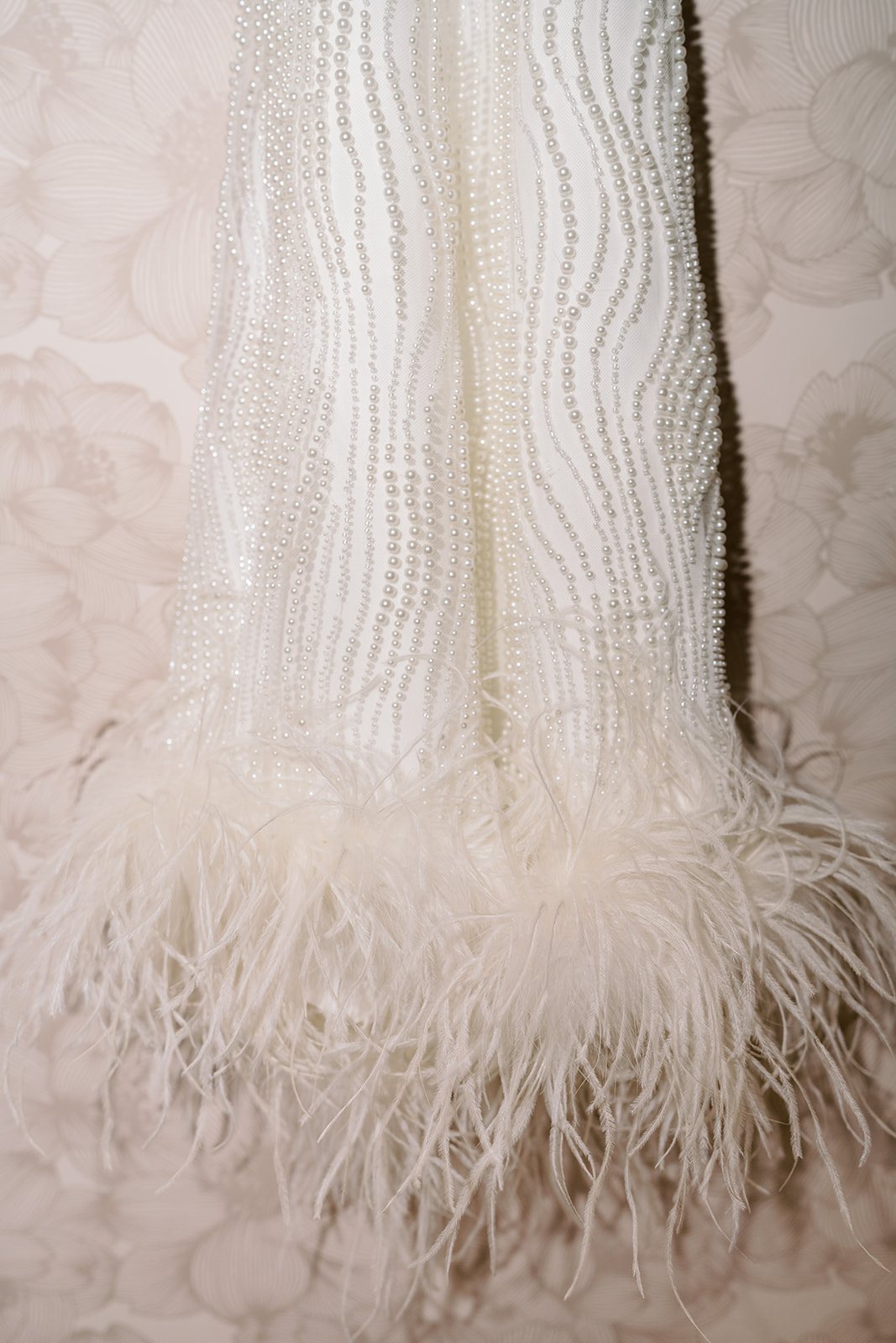 Clint and Ania wedding: wedding dress feather detail.