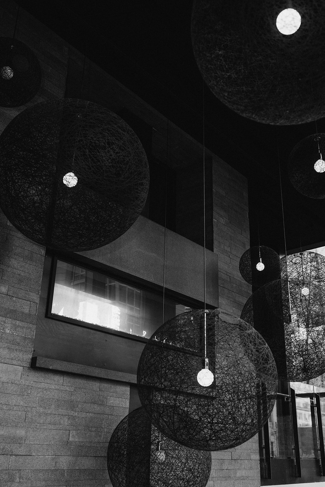 Clint and Ania wedding: chicago winery lighting black white.