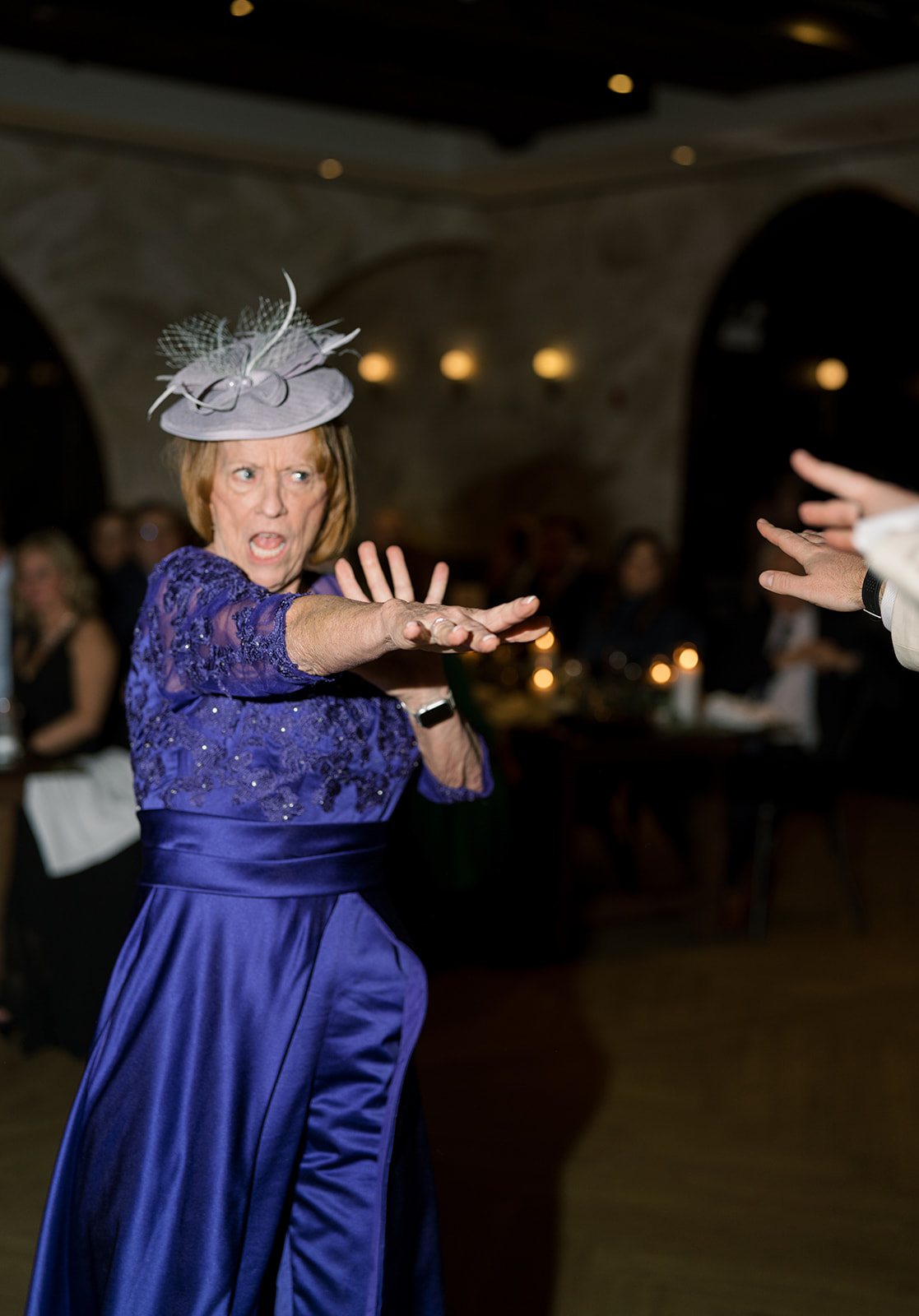 Clint and Ania wedding: reception guest dancing.