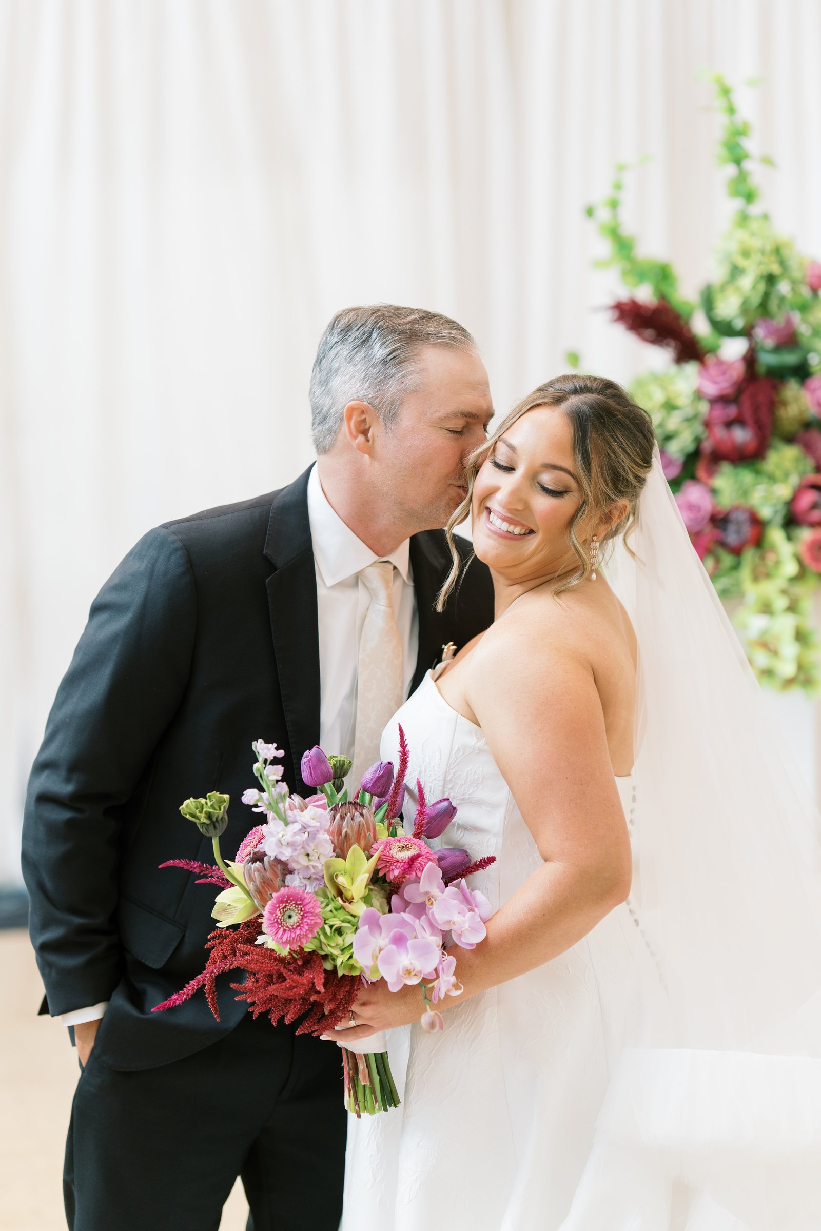 Kent and Nicolette wedding: kent nicolette bouquet kiss portrait.