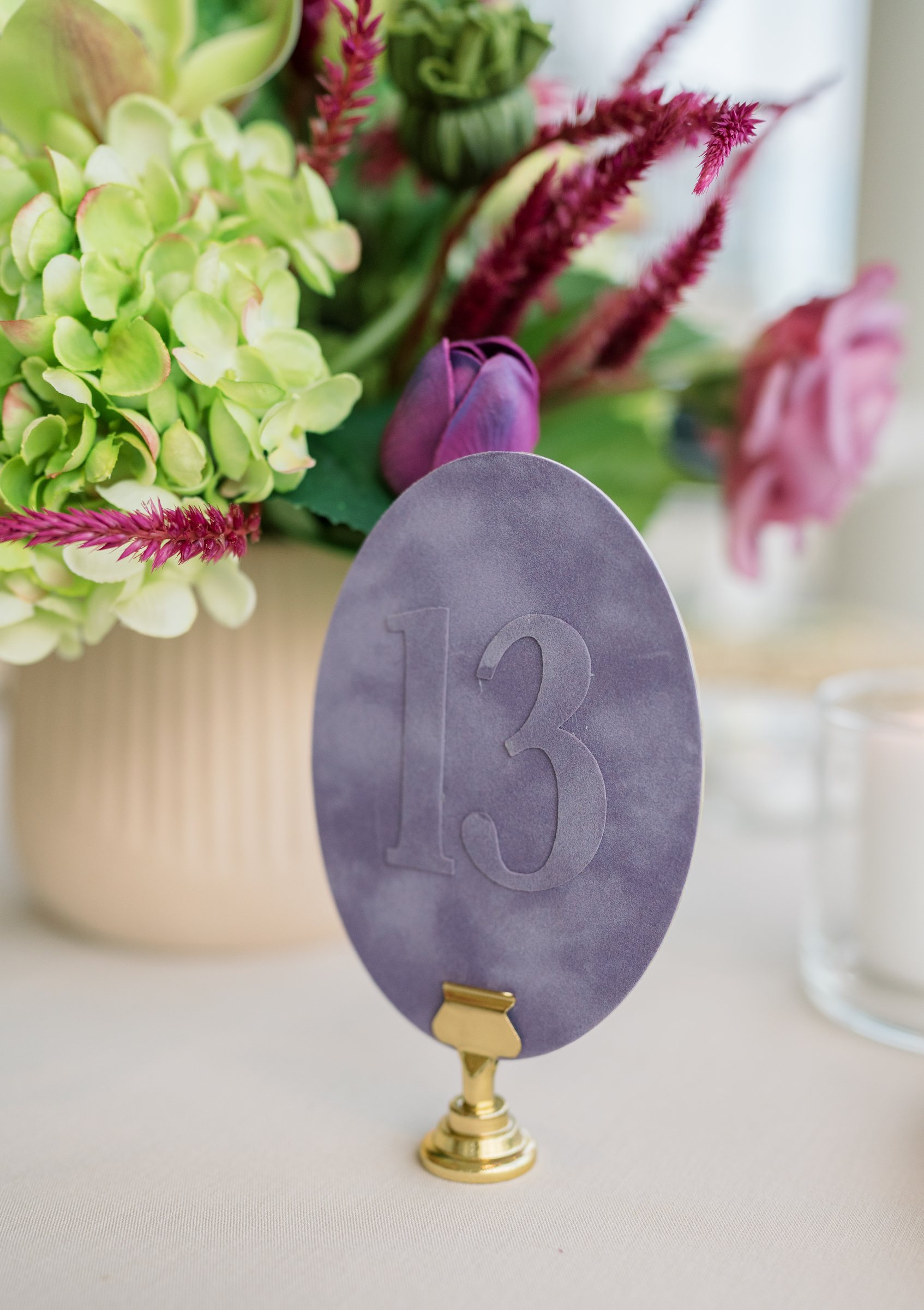 Kent and Nicolette wedding: reception table number thirteen.