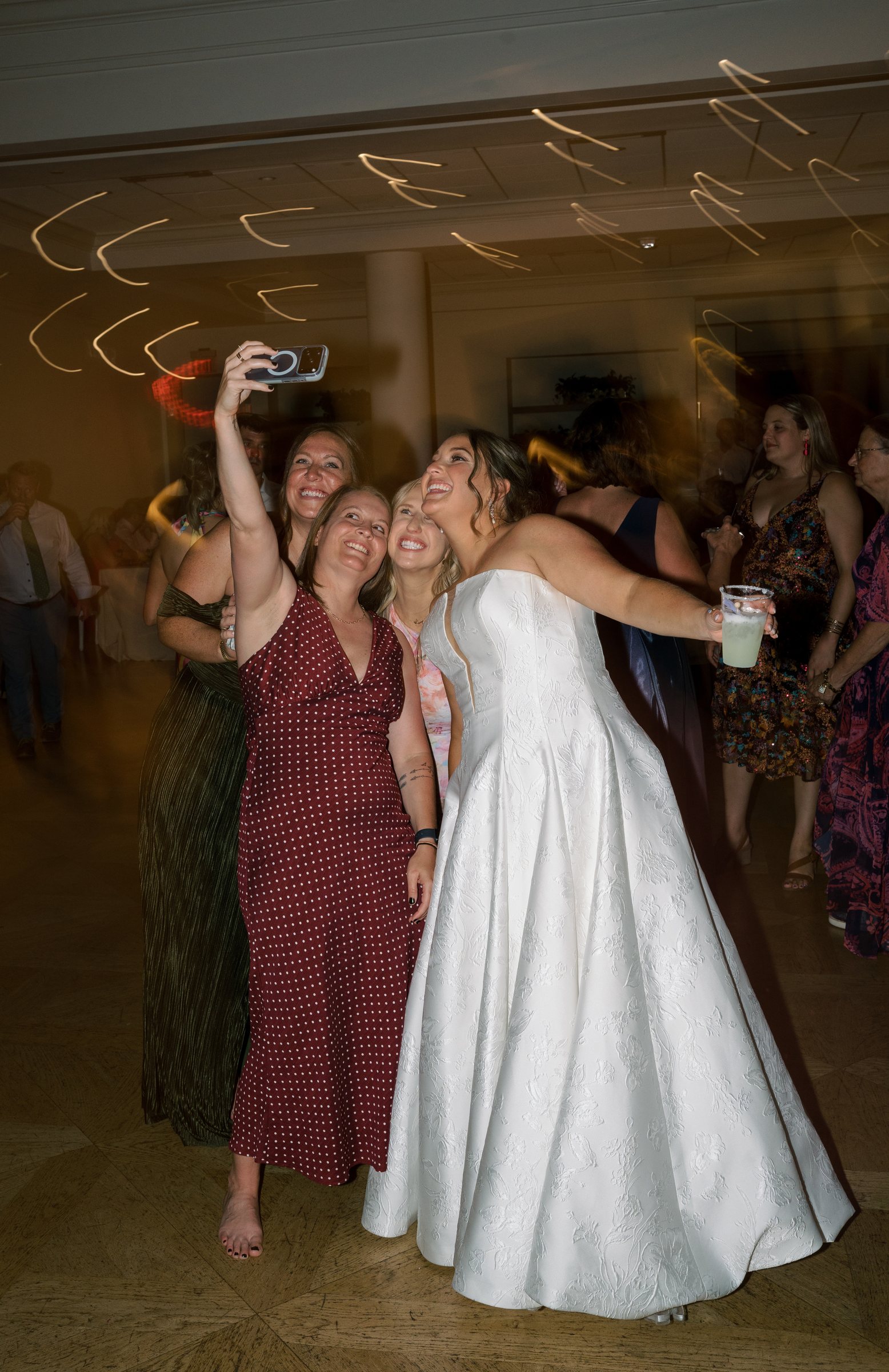 Kent and Nicolette wedding: nicolette dancing with guests.
