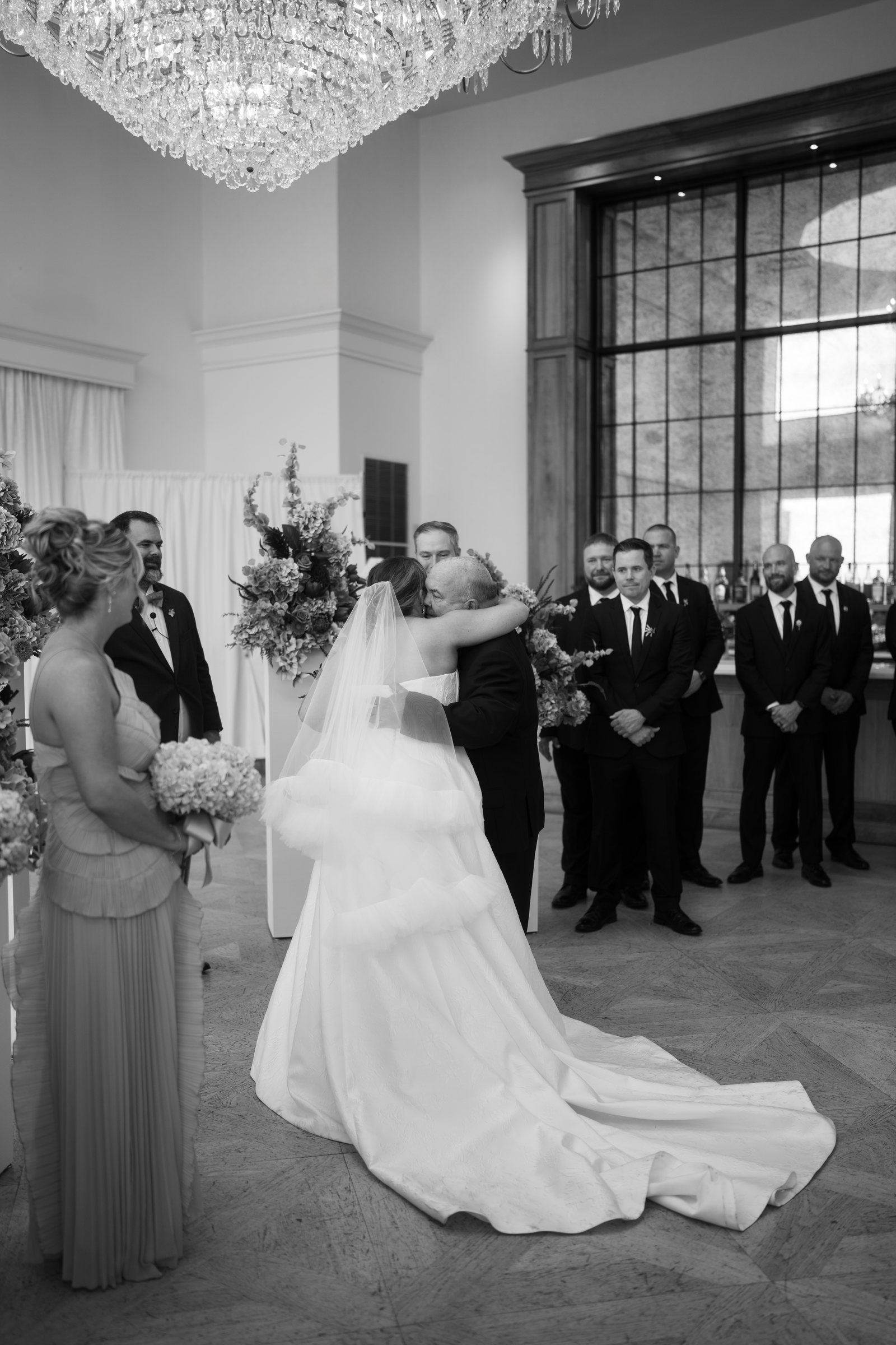 Kent and Nicolette wedding: ceremony candid black white.