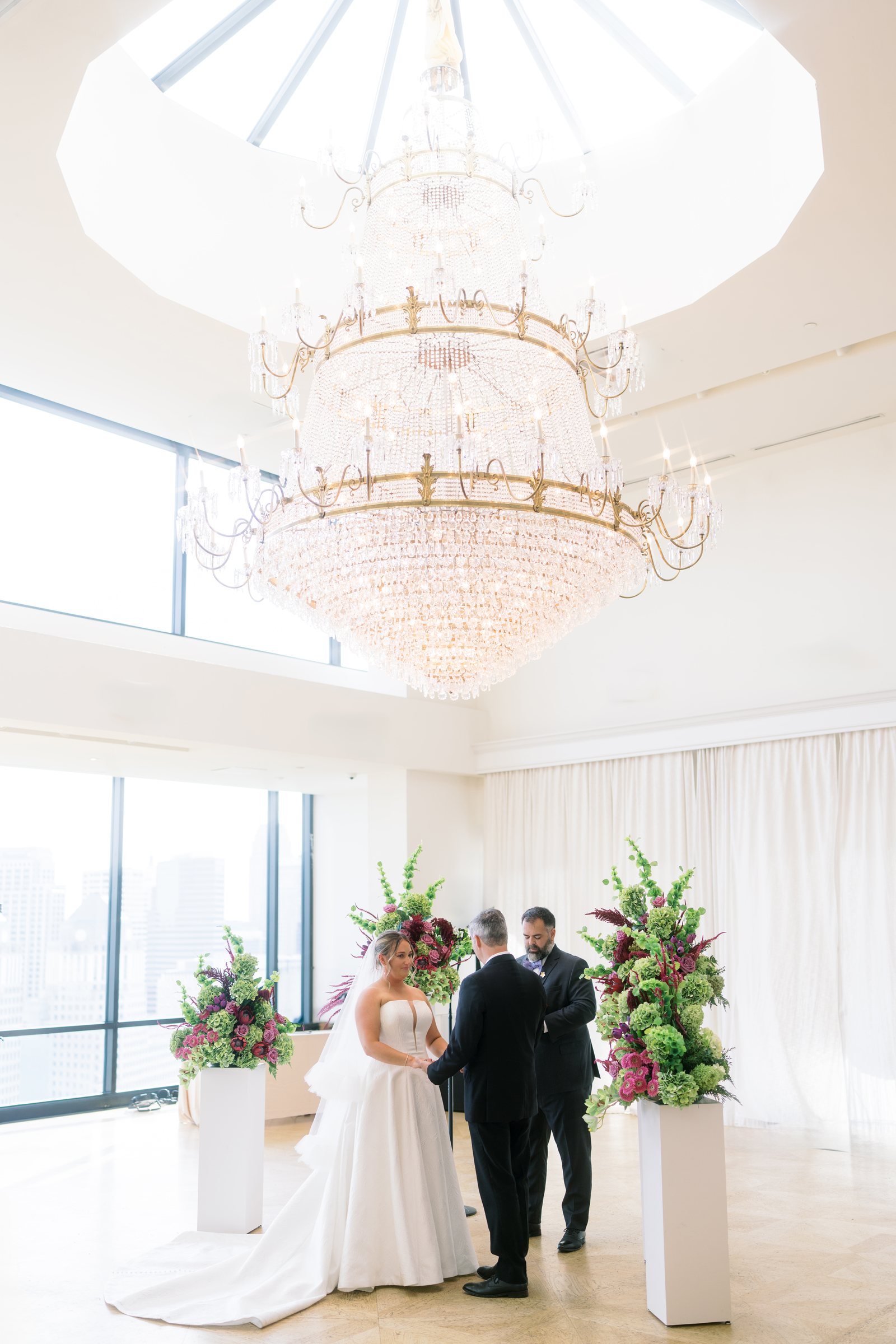 Kent and Nicolette wedding: kent nicolette ceremony chandelier wide two.