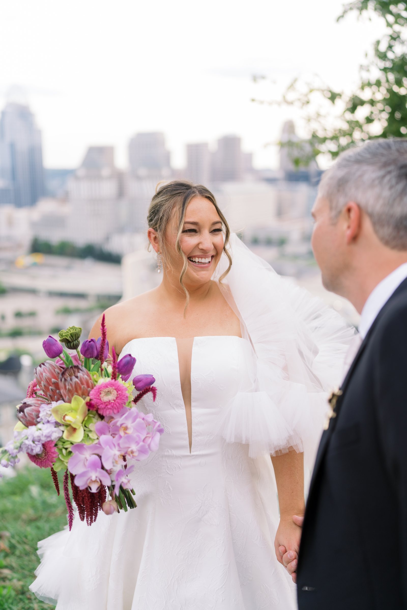 Kent and Nicolette wedding: nicolette skyline laughing portrait.