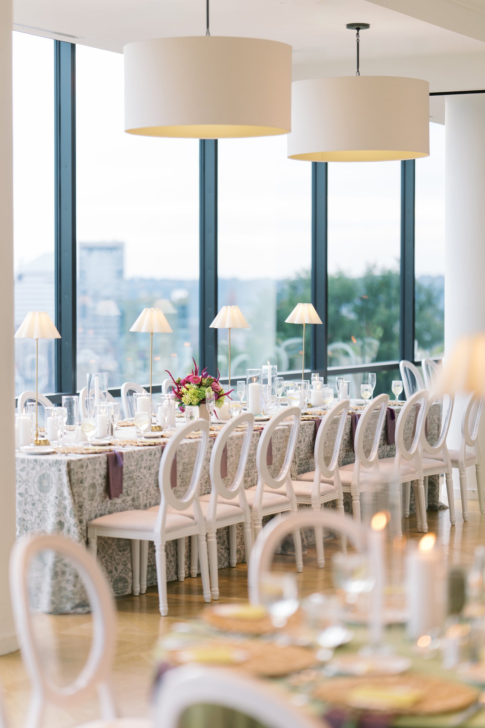 Reception tables beside large windows with Cincinnati views at The View at Mt. Adams