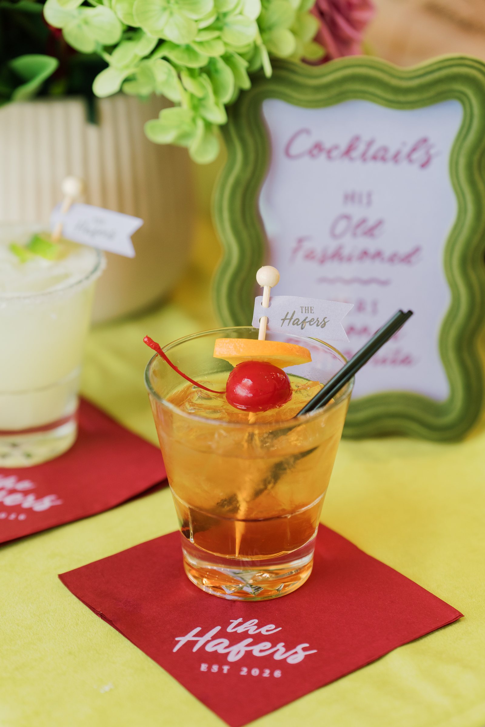 Kent and Nicolette wedding: signature cocktail red cherry.