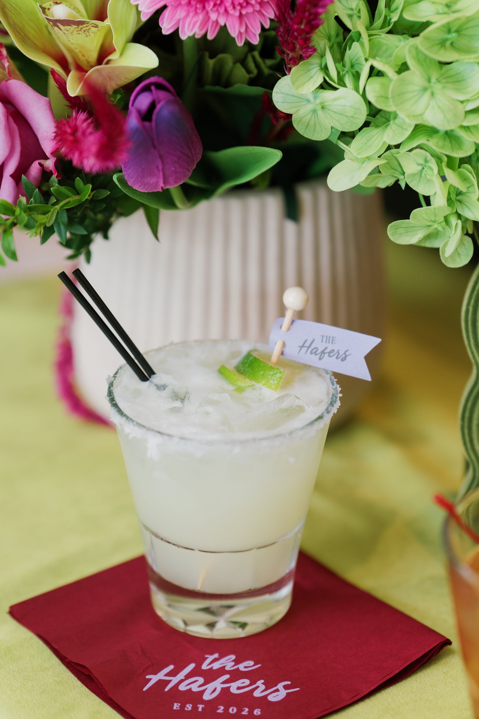 Kent and Nicolette wedding: signature cocktail white drink.