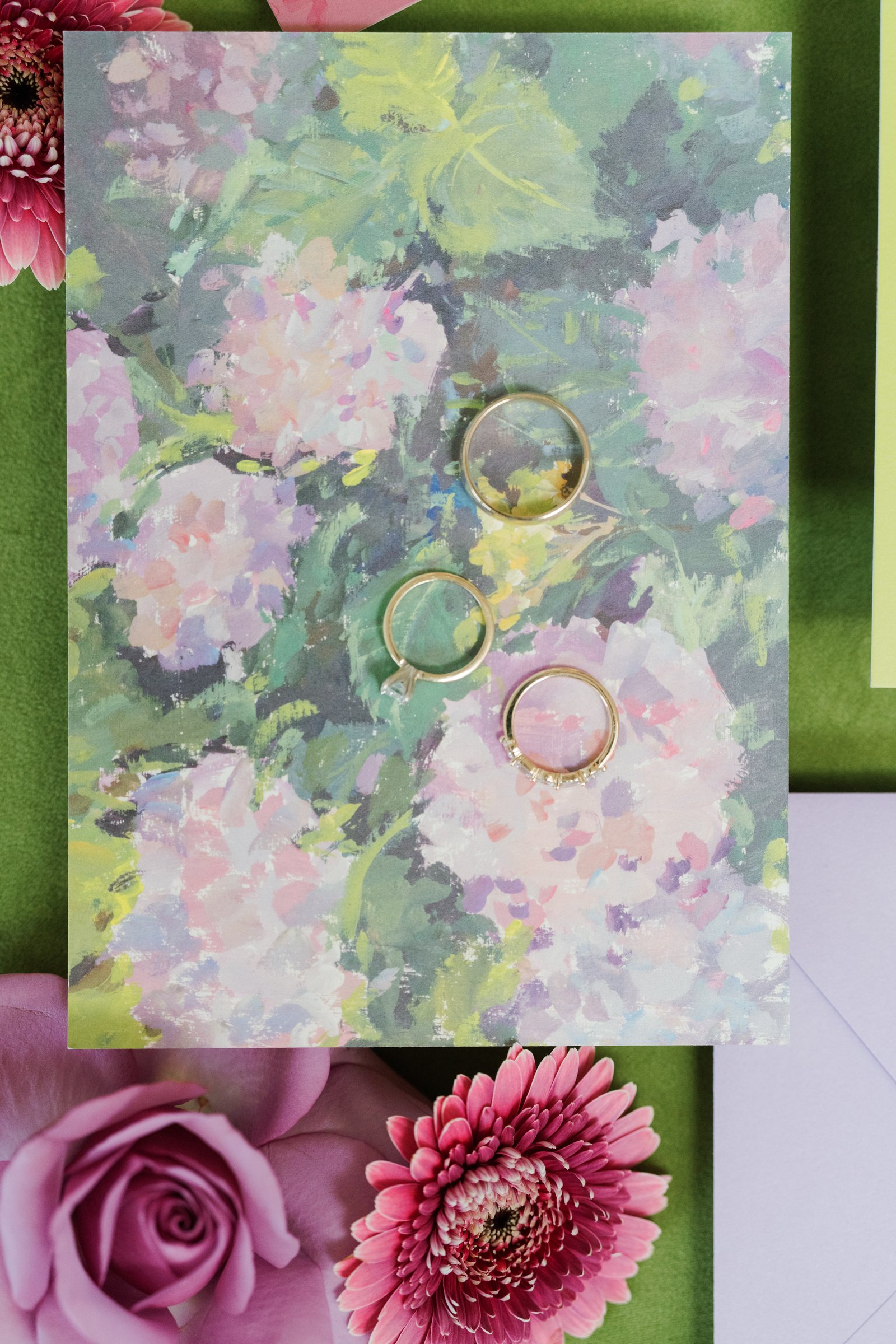 Kent and Nicolette wedding: wedding rings painted stationery.
