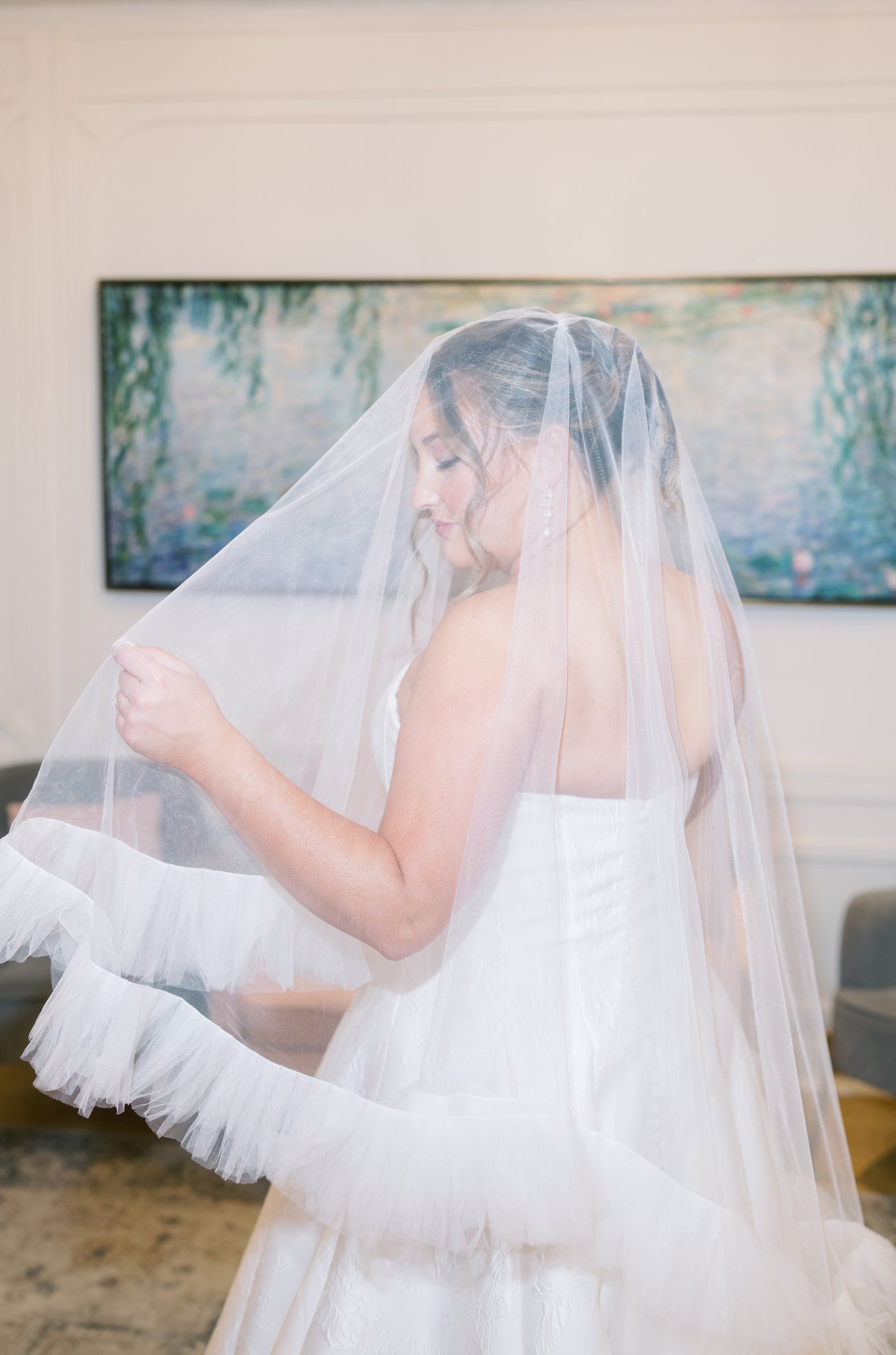 Nicolette in her wedding veil during bridal preparations