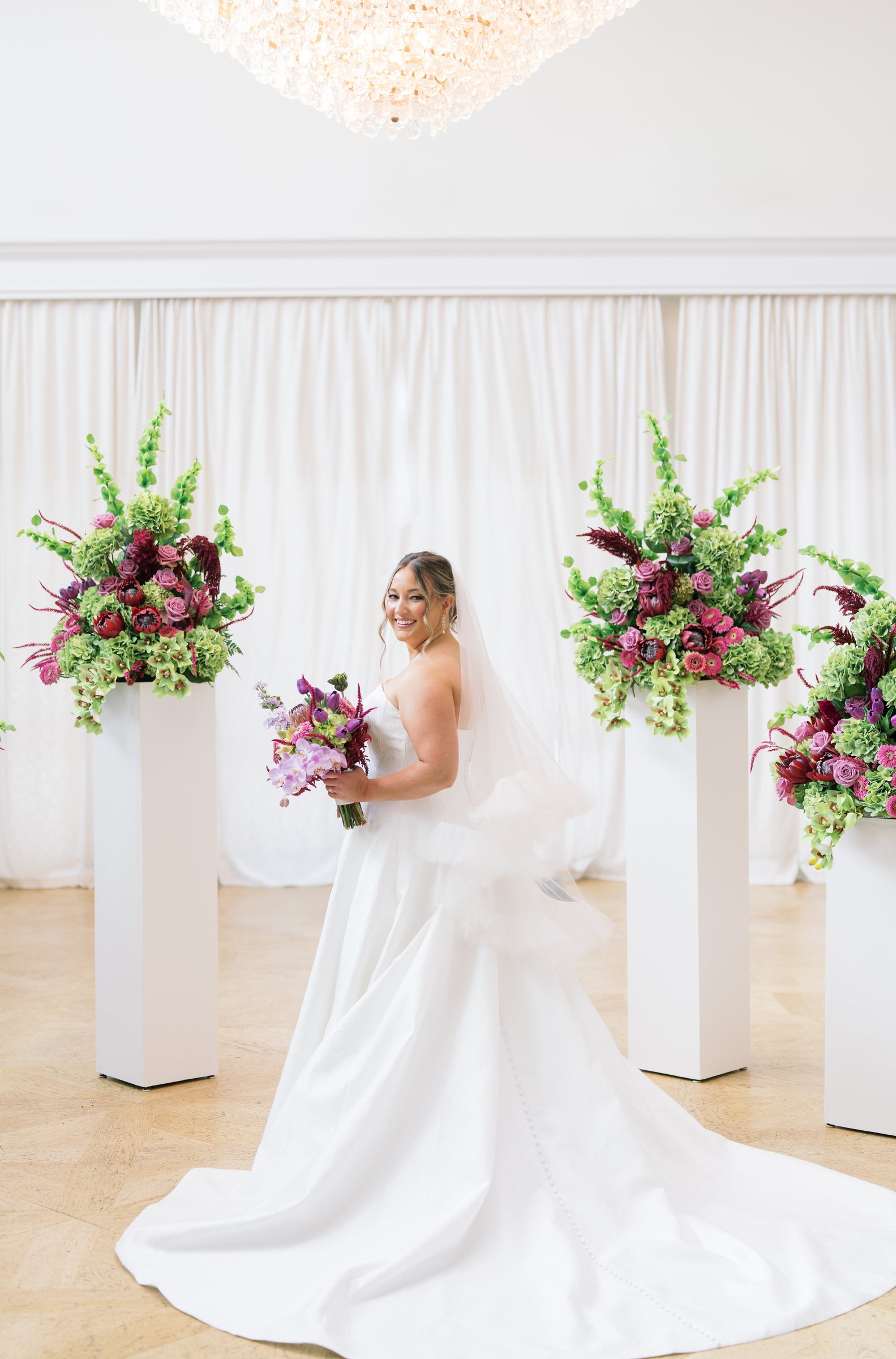 Kent and Nicolette wedding: nicolette ceremony backdrop bridal portrait.