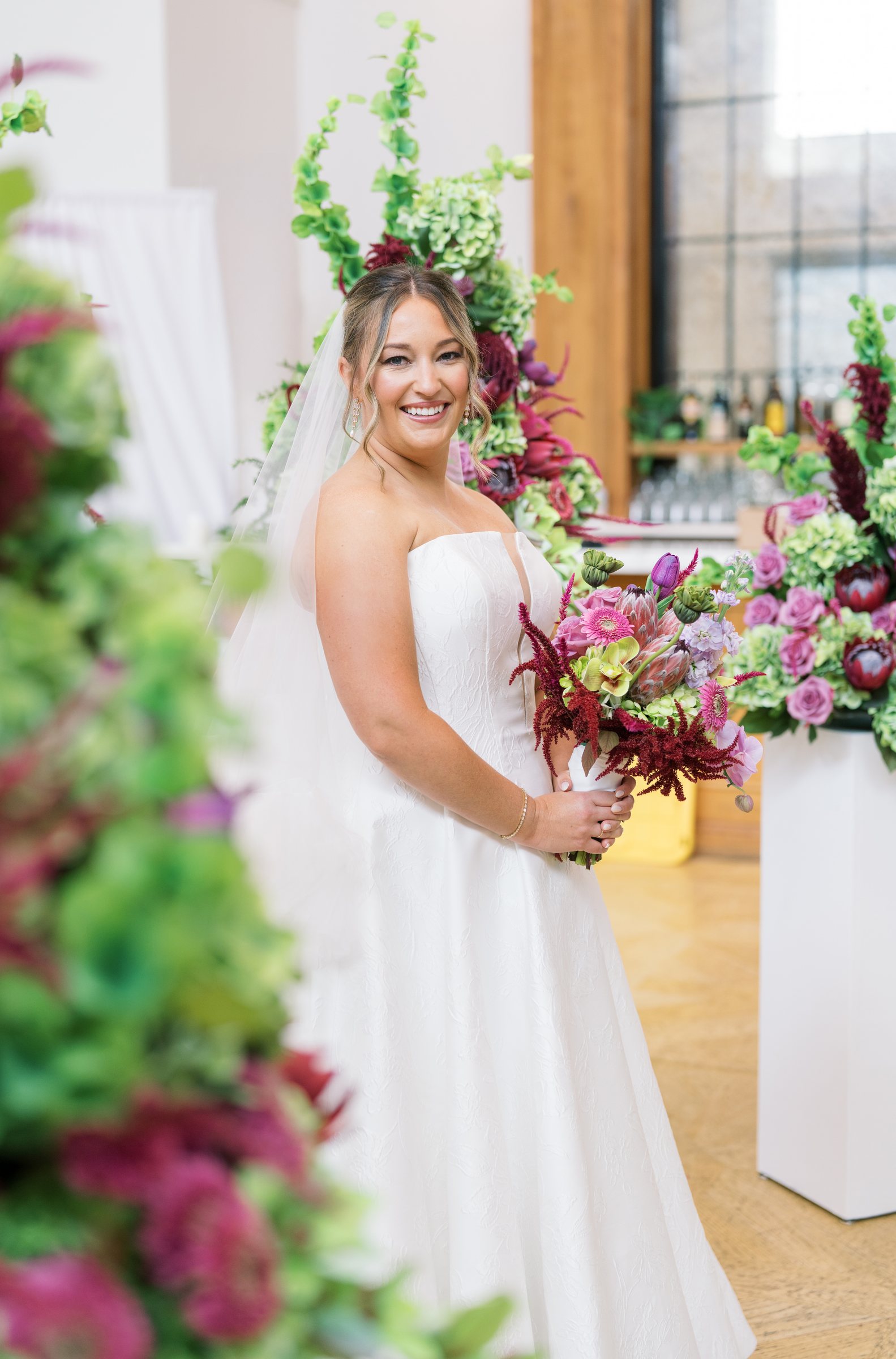 Kent and Nicolette wedding: nicolette colorful bouquet portrait.
