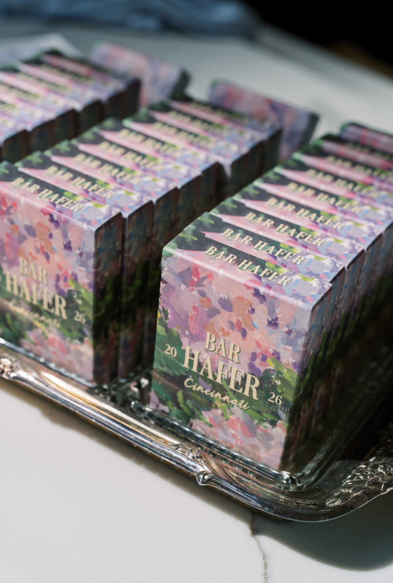 Kent and Nicolette wedding: floral pattern wedding favor boxes.