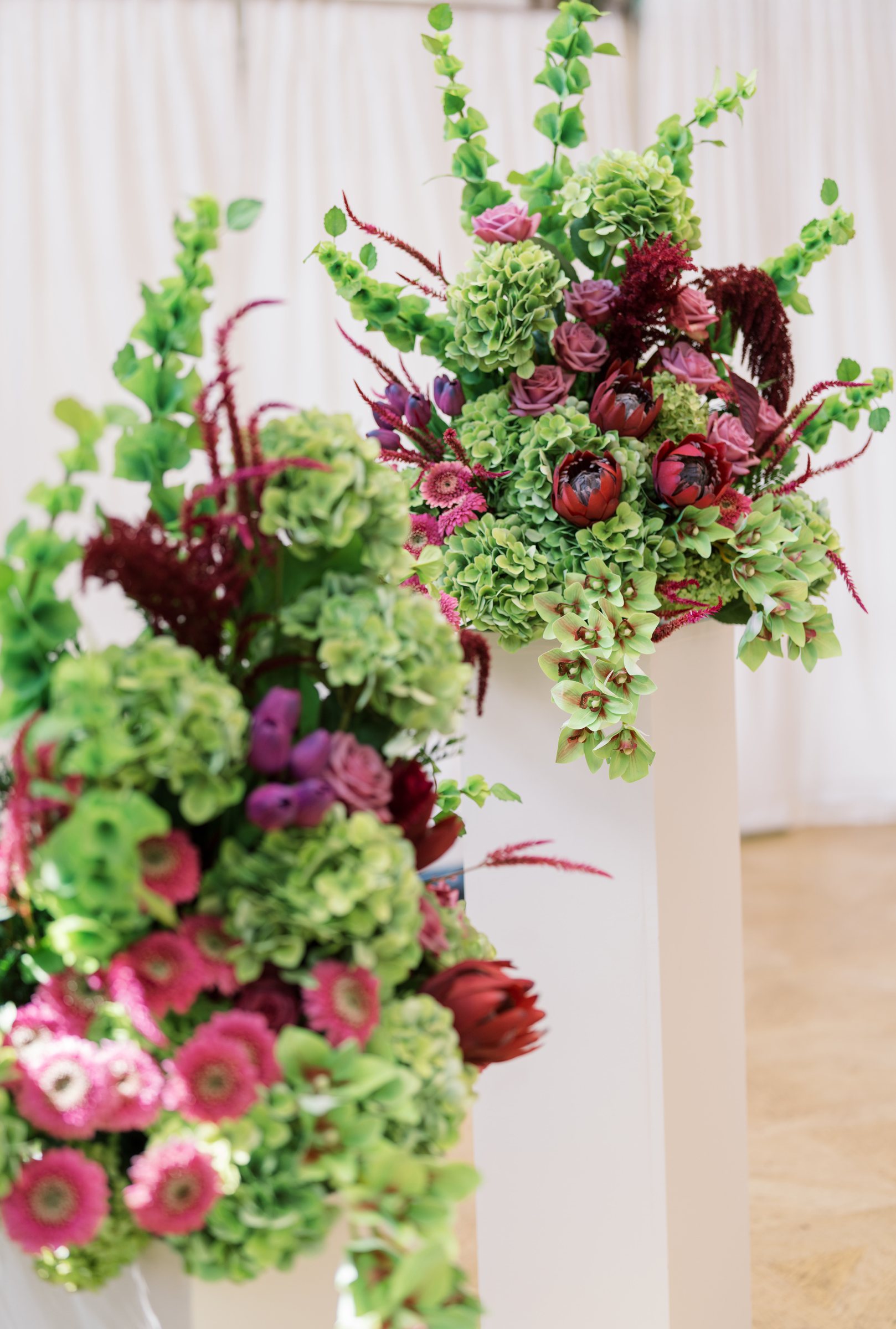 Kent and Nicolette wedding: ceremony floral installation closeup.