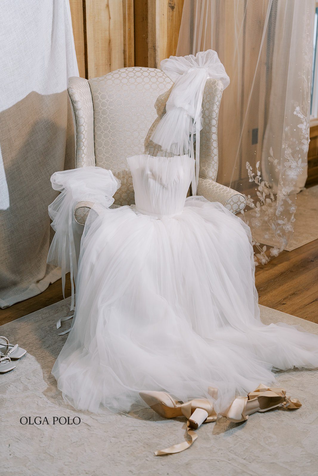 Maia's wedding dress hanging during getting-ready preparations