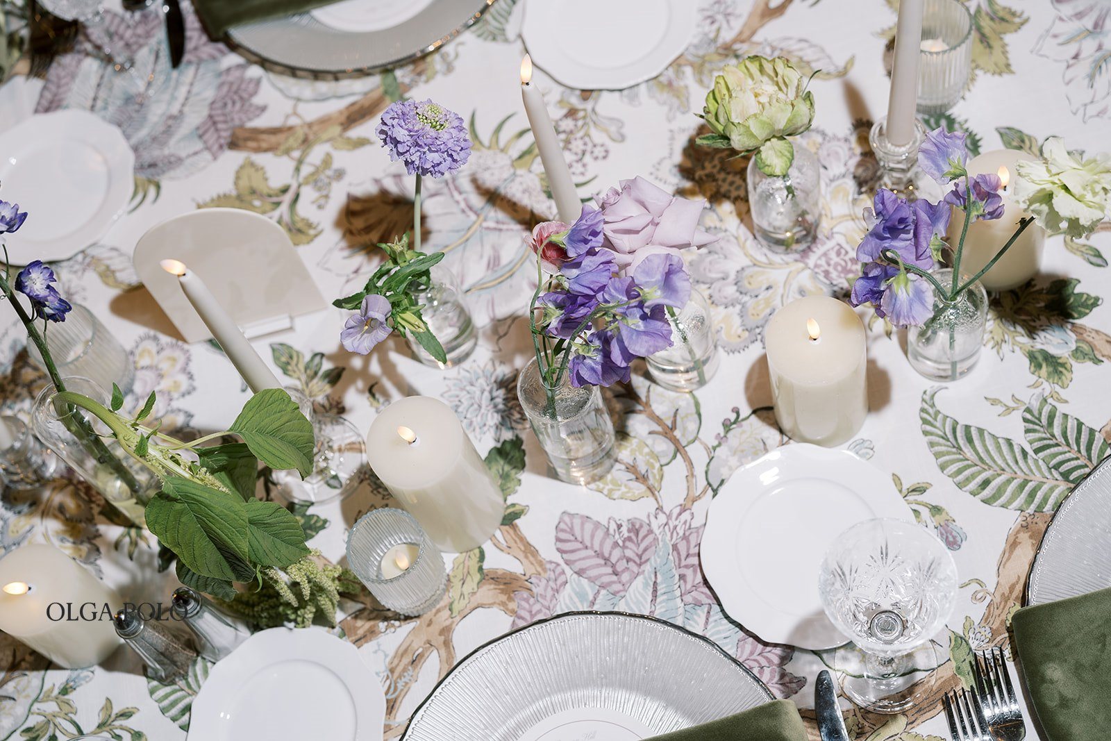 Reception table design with purple florals and green accents at Boone Valley Farm