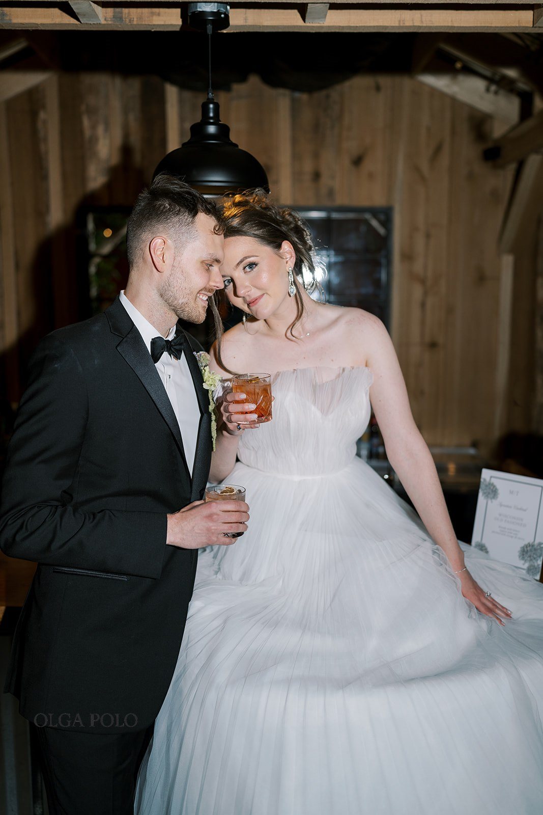 Maia and Troy during an indoor reception portrait at Boone Valley Farm