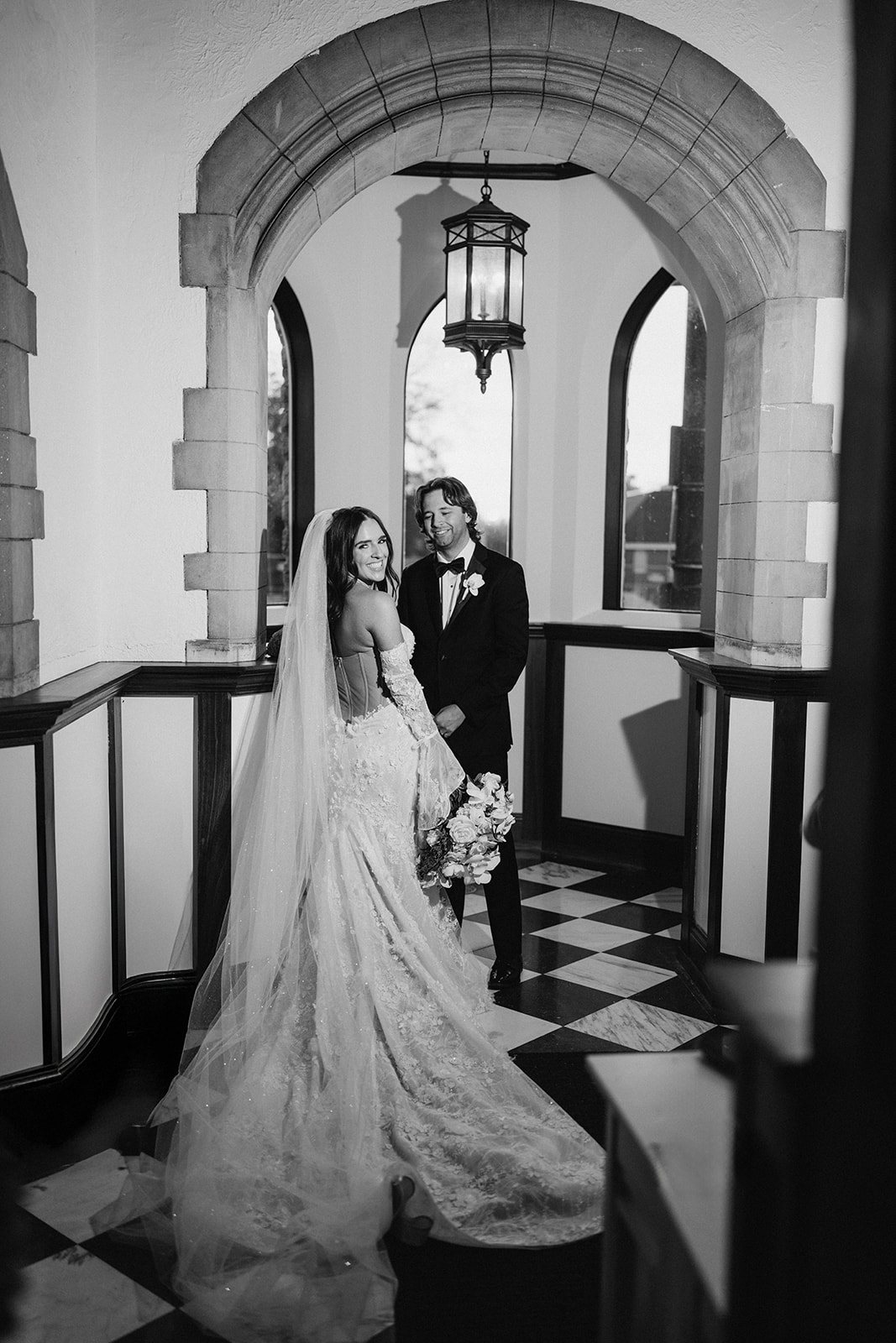 Black-and-white portrait of Ronnie and Patrick inside The Palomar Cincinnati