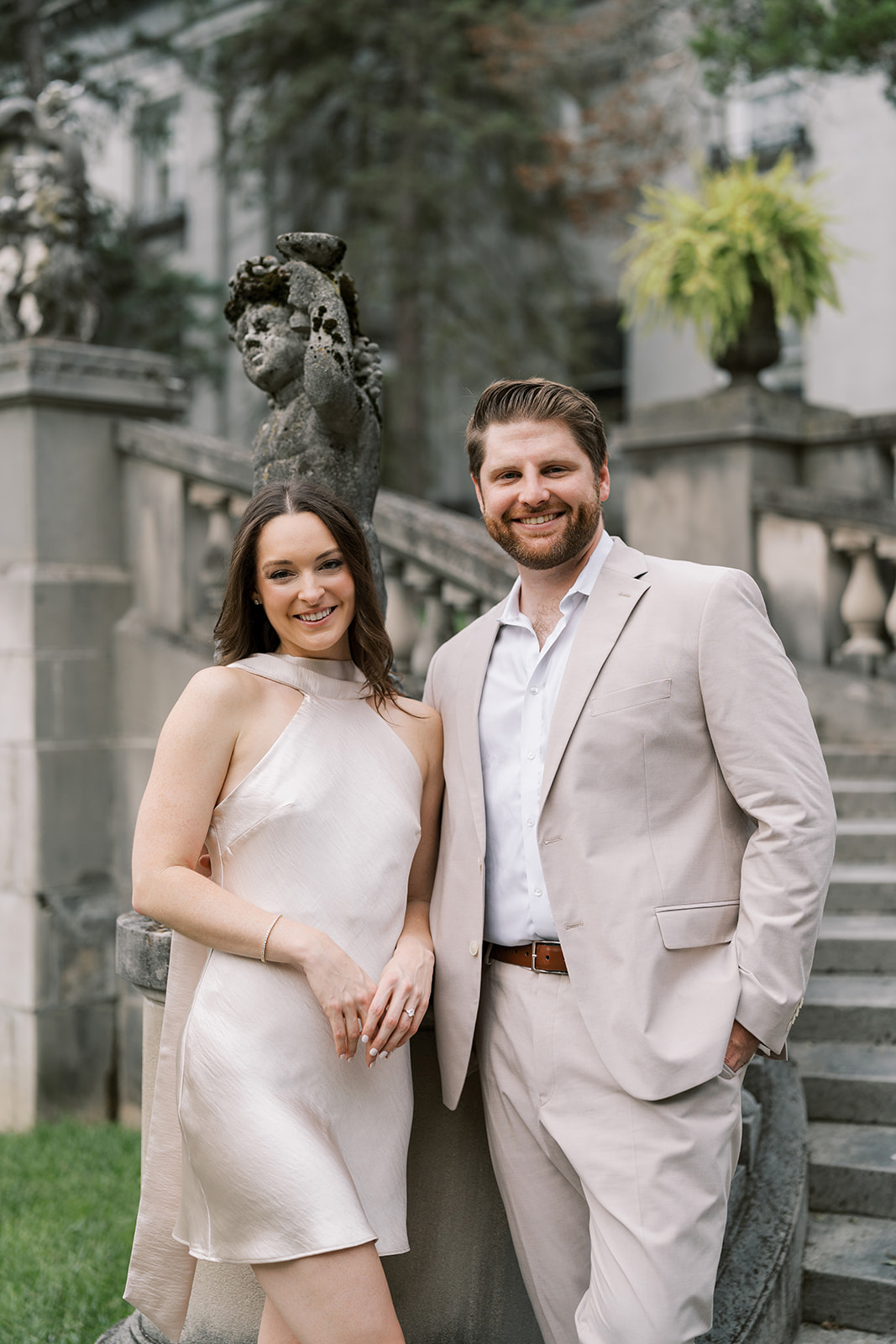 Frank and Noelle standing together near Laurel Court's exterior staircase