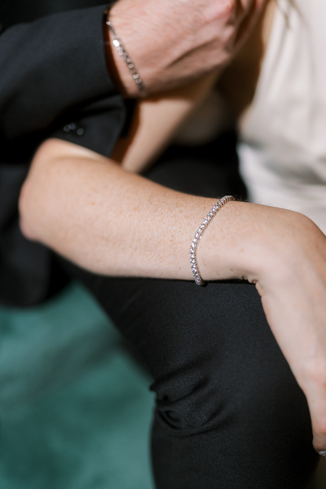 Close detail of Noelle's bracelet during the engagement session