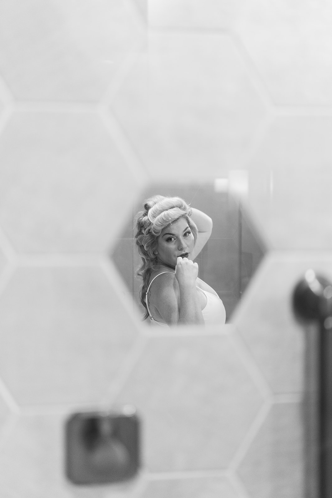 Autumn getting ready in front of a mirror at The Lytle Park Hotel
