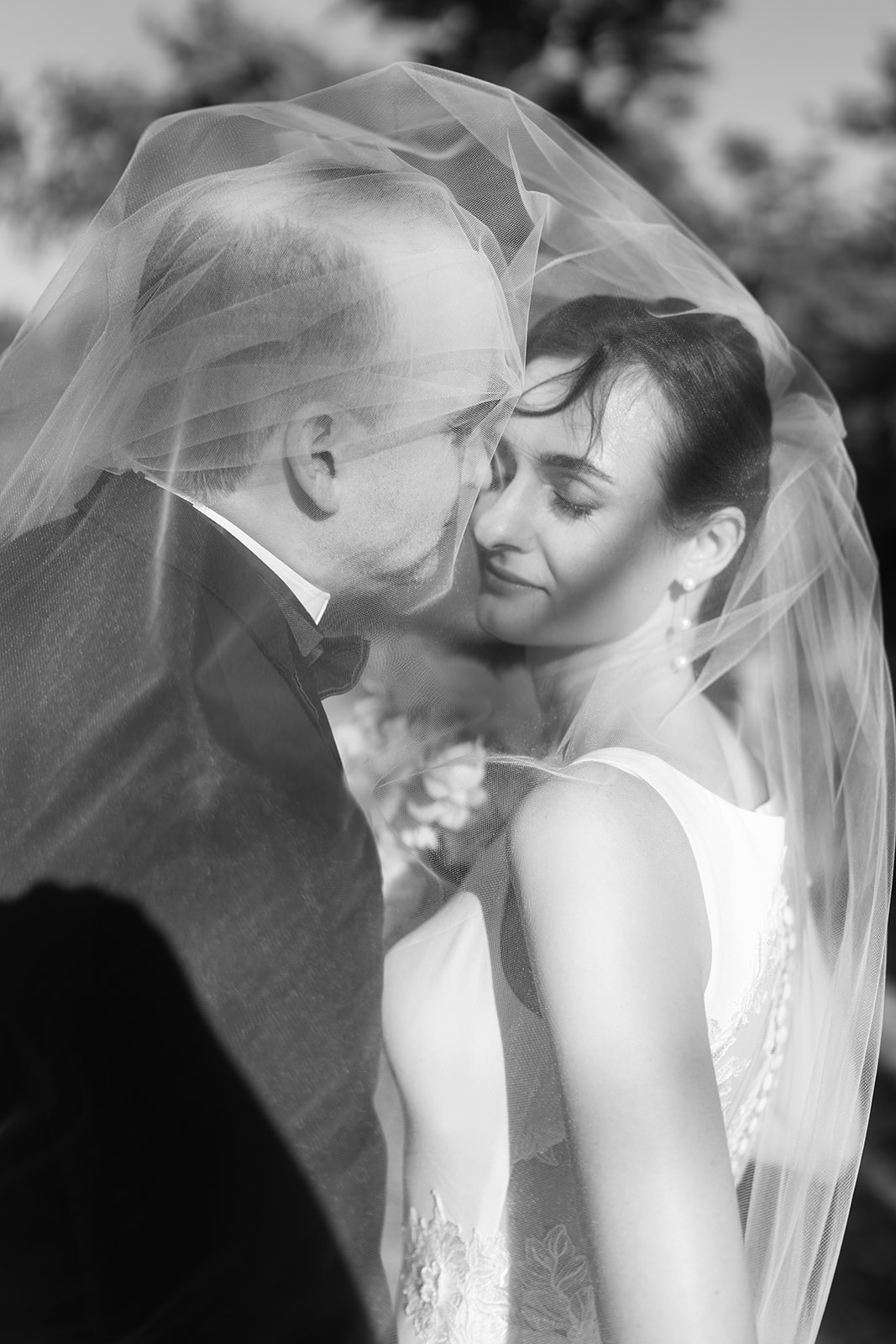 Black-and-white close portrait of Michael and Julia together