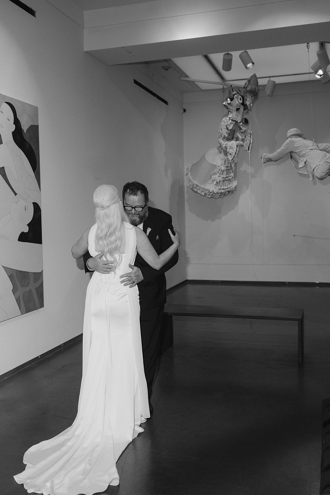 Black-and-white portrait of Niamh and Titus together inside 21c Museum Hotel Cincinnati