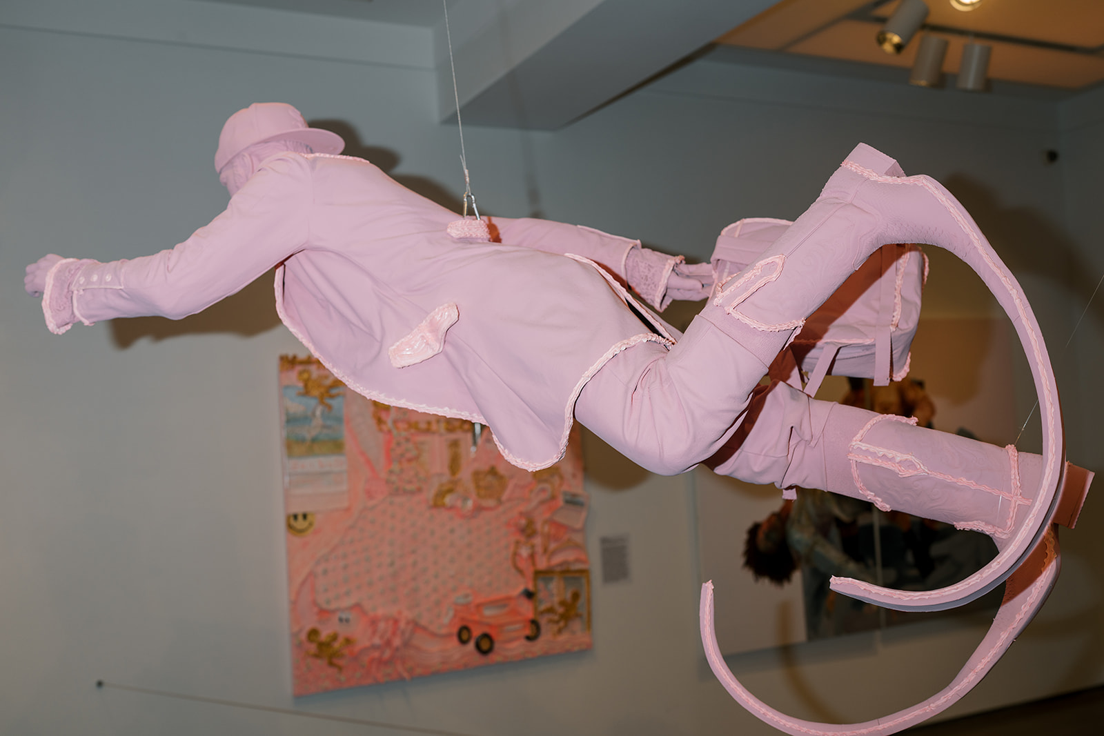 Pink suspended penguin artwork inside 21c Museum Hotel Cincinnati