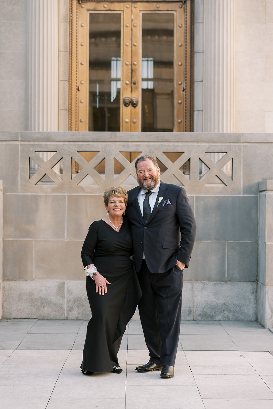 Two family members posing together outside Cincinnati Art Museum