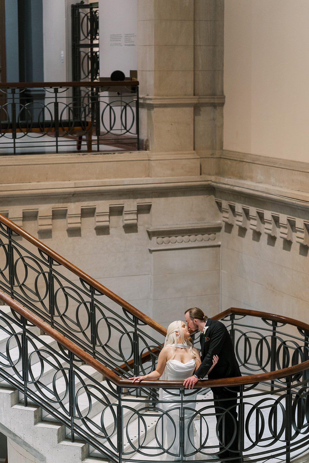 Niamh and Titus on the grand staircase inside Cincinnati Art Museum