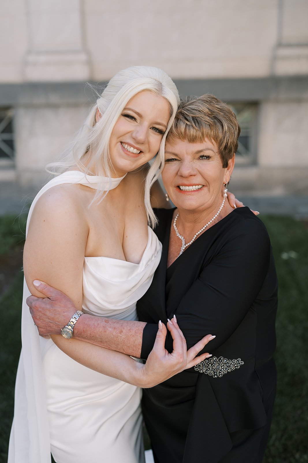 Niamh smiling with a family member outside Cincinnati Art Museum