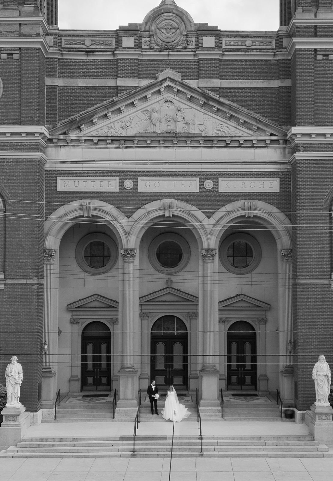 Ben and Hannalee at the front steps of Mother of God Church in Covington