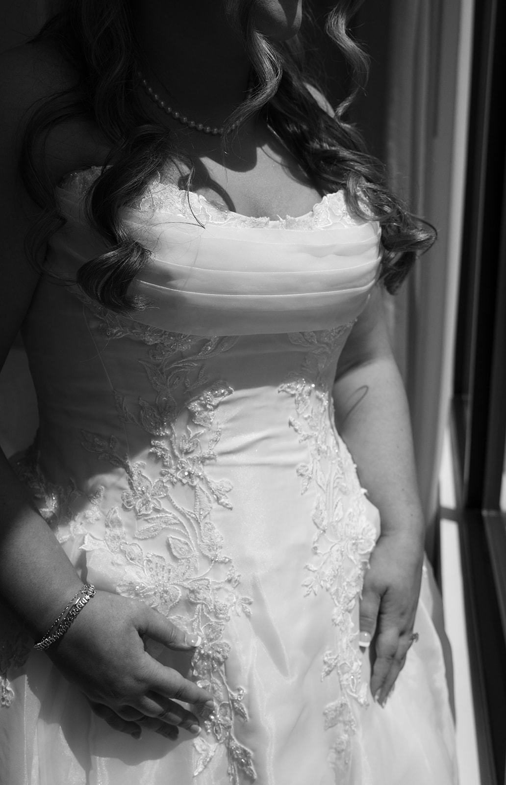 Black-and-white detail of Hannalee's wedding gown bodice
