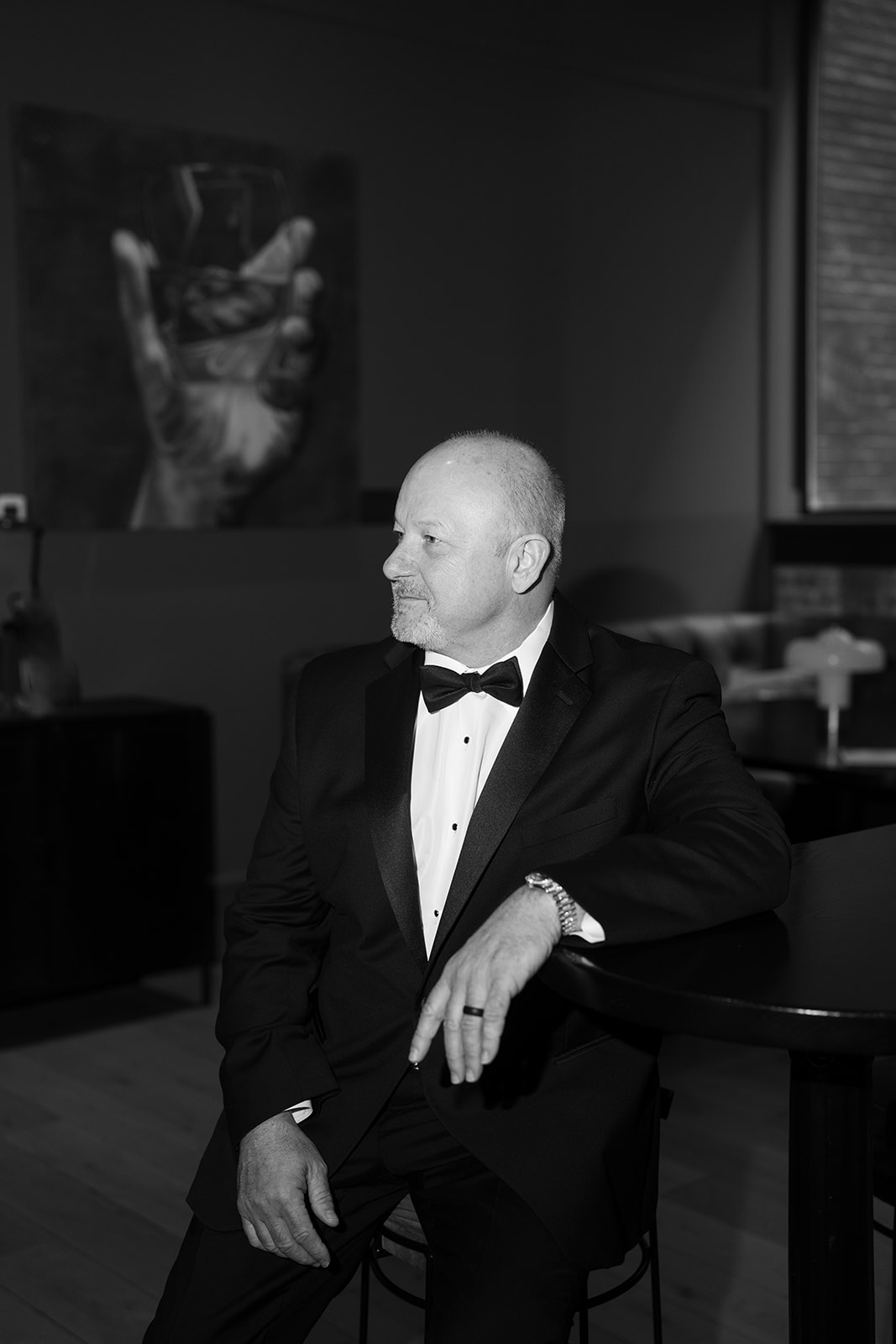 Black-and-white portrait of Ben in his tuxedo