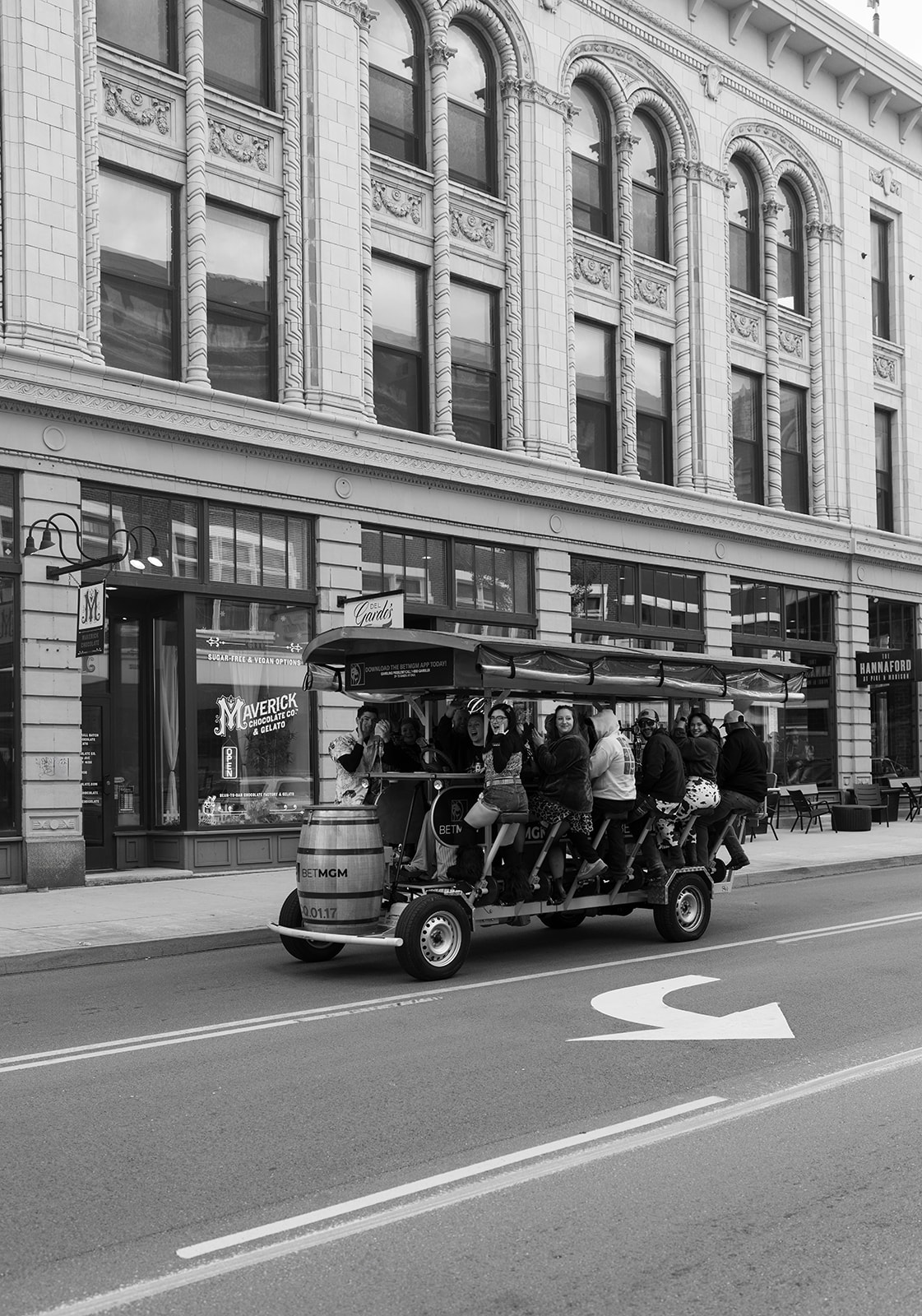 Black-and-white street scene in Covington during the wedding-party portraits
