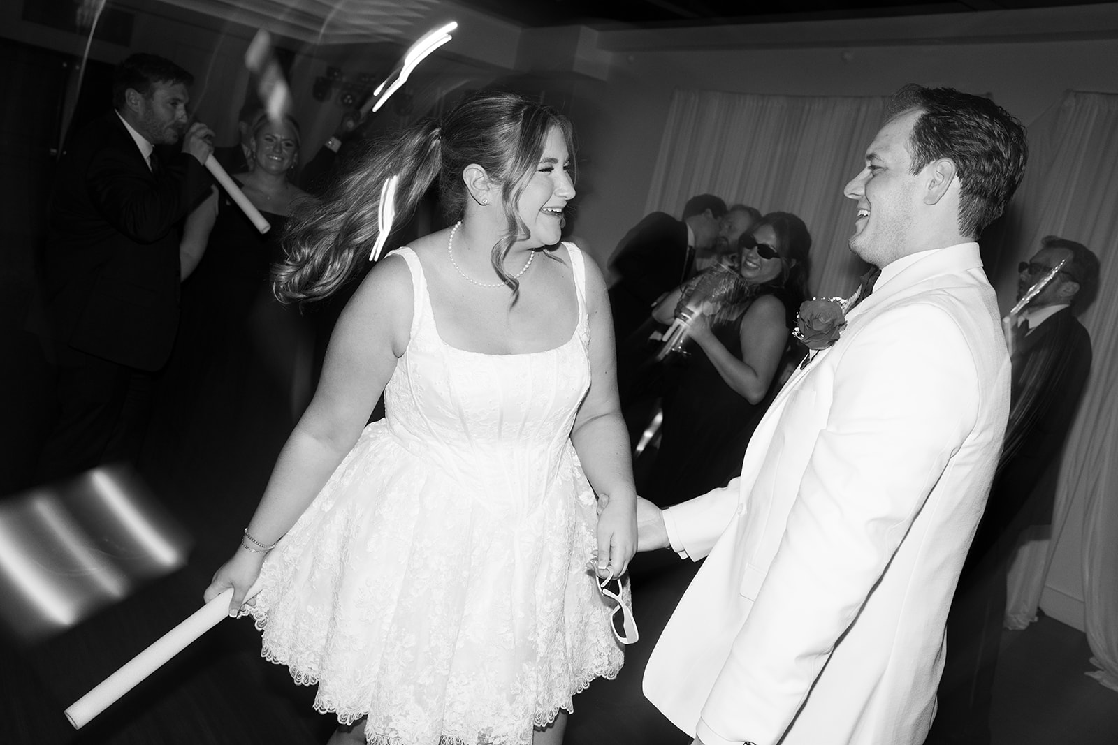 Black-and-white photograph of Hannalee dancing with a guest